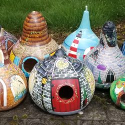 Hand painted and artist designed gourd birdhouses Hand painted and artist designed gourd birdhouses